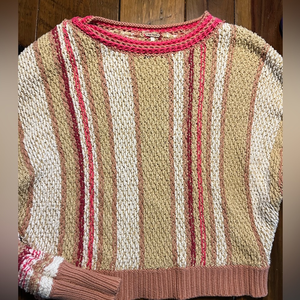 Cozy, cropped Free People sweater.